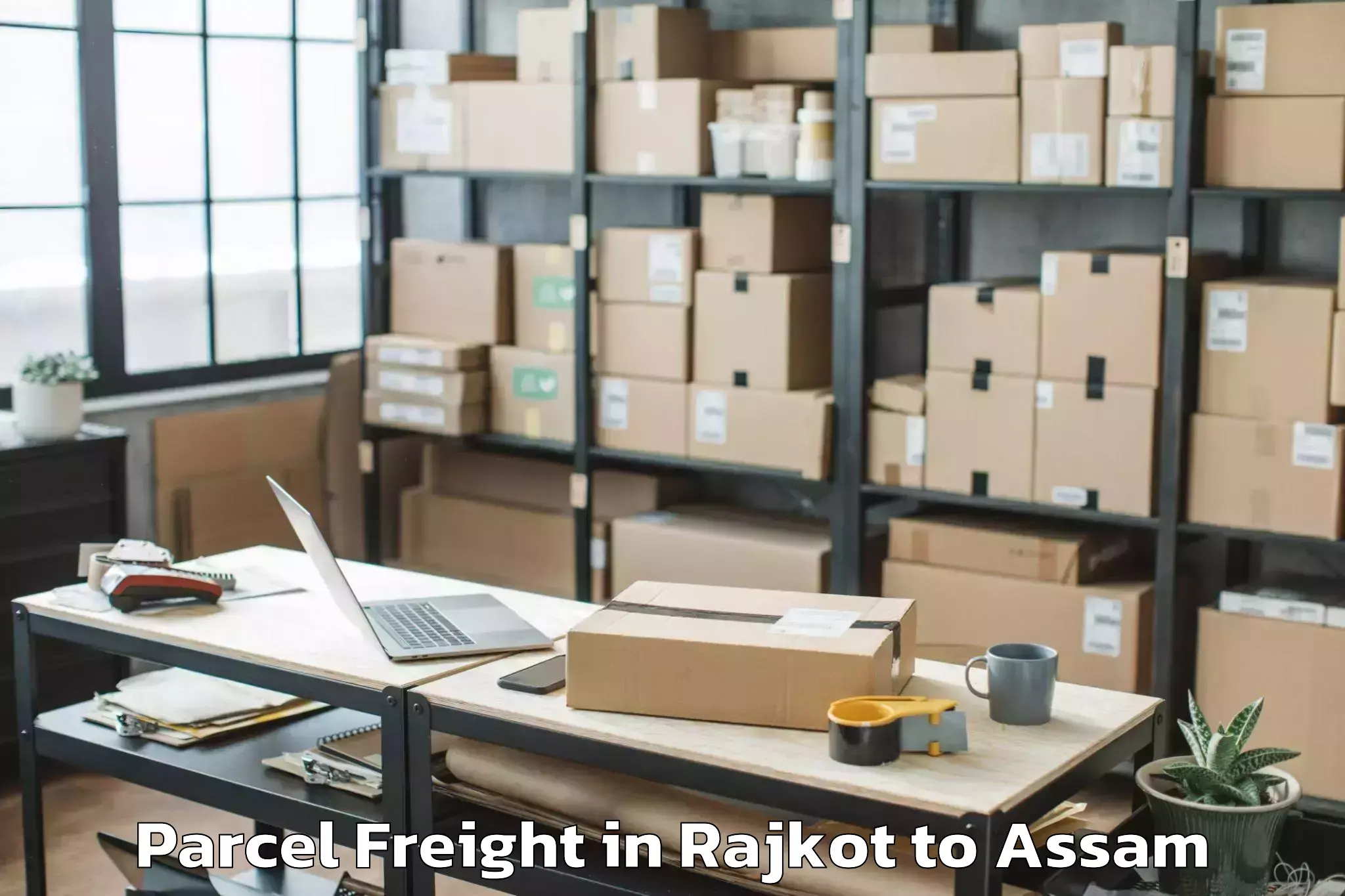 Easy Rajkot to Rangapara Parcel Freight Booking